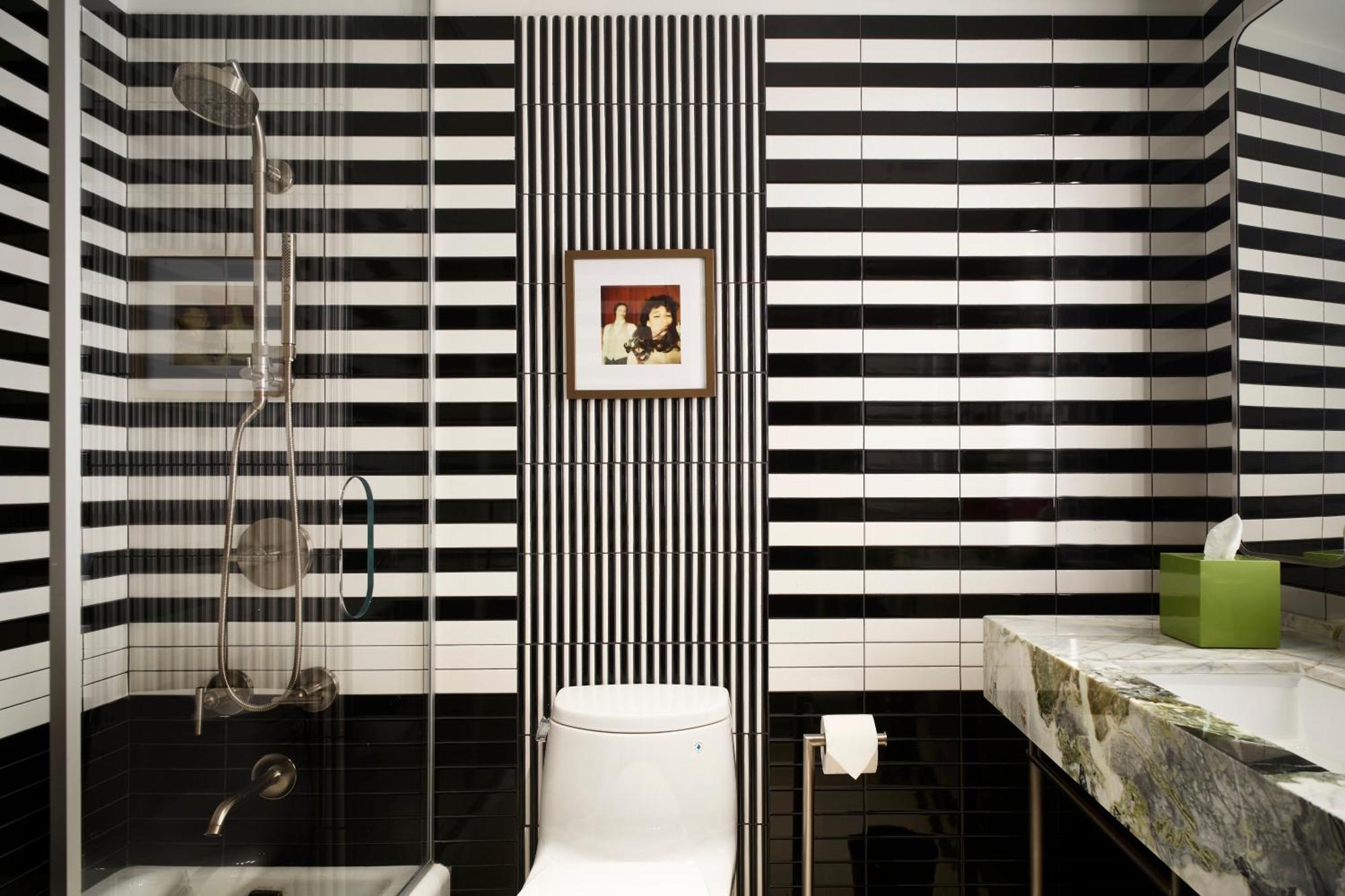 Quarto com Cama King-size e Vista da Cidade